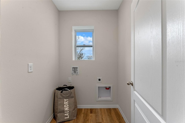 3349 Wynwood Forest Dr, Ocoee, FL 34761 - laundry room featuring hookup for an electric dryer, wood finished floors, and washer hookup