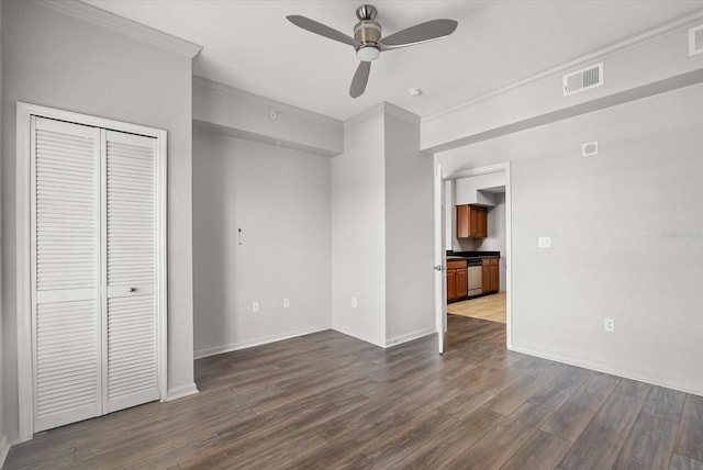 8101 Resort Village Dr Unit 31503, Orlando, FL 32821 - unfurnished living room featuring a ceiling fan, dark wood-style floors, and ornamental molding