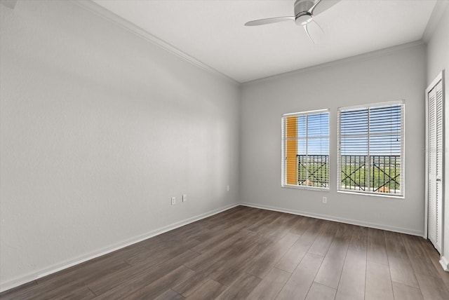 8101 Resort Village Dr Unit 31503, Orlando, FL 32821 - unfurnished room with ceiling fan, dark wood-type flooring, and crown molding