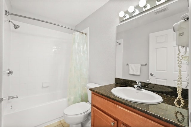 8101 Resort Village Dr Unit 31503, Orlando, FL 32821 - full bathroom featuring shower / bath combo, vanity, and tile patterned floors