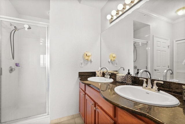 8101 Resort Village Dr Unit 31503, Orlando, FL 32821 - full bath featuring a shower stall, double vanity, ornamental molding, and tile patterned floors