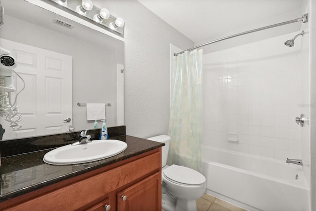 8101 Resort Village Dr Unit 31503, Orlando, FL 32821 - full bath featuring vanity, shower / tub combo, tile patterned flooring, and a textured wall