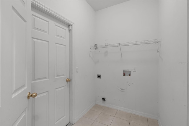 3533 Somerset Cir, Kissimmee, FL 34746 - washroom featuring hookup for an electric dryer, hookup for a washing machine, and light tile patterned flooring