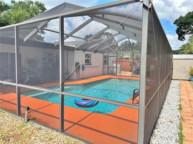 1428 Glendale St, Lakeland, FL 33803 - view of swimming pool with glass enclosure and a patio area