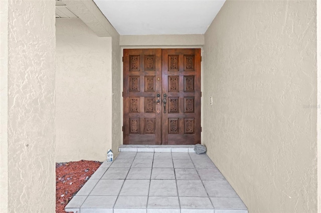 2113 Lochmoor Cir, North Fort Myers, FL 33903 - entrance to property featuring stucco siding