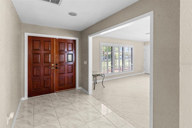 2113 Lochmoor Cir, North Fort Myers, FL 33903 - entryway with baseboards