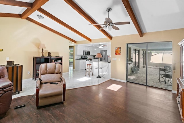 2113 Lochmoor Cir, North Fort Myers, FL 33903 - living area featuring ceiling fan and light wood finished floors