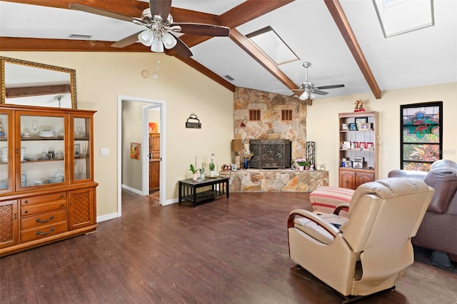 2113 Lochmoor Cir, North Fort Myers, FL 33903 - living area featuring ceiling fan, dark wood-style floors, a fireplace, and a skylight