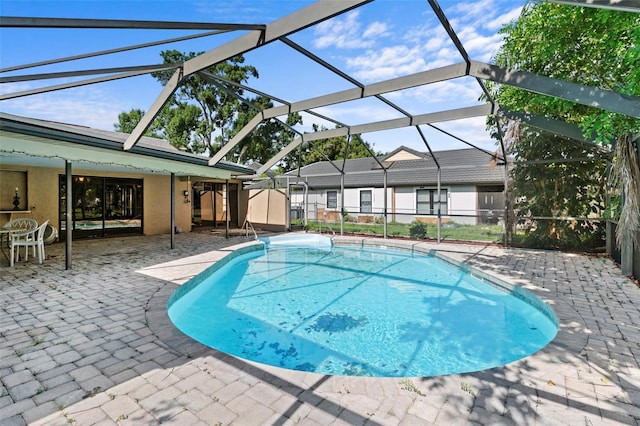 2113 Lochmoor Cir, North Fort Myers, FL 33903 - outdoor pool with a patio and a lanai