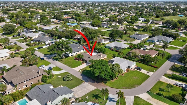 2113 Lochmoor Cir, North Fort Myers, FL 33903 - aerial overview of property's location with nearby suburban area