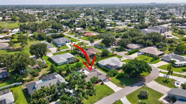 2113 Lochmoor Cir, North Fort Myers, FL 33903 - aerial overview of property's location with nearby suburban area