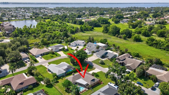 2113 Lochmoor Cir, North Fort Myers, FL 33903 - aerial view of residential area with a nearby body of water