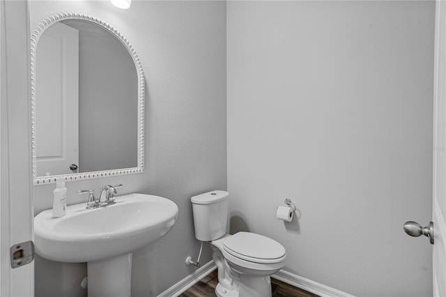 840 Livestock Loop, Saint Cloud, FL 34771 - bathroom with wood finished floors and toilet