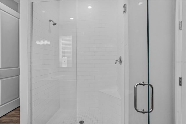 840 Livestock Loop, Saint Cloud, FL 34771 - bathroom with a stall shower and wood finished floors