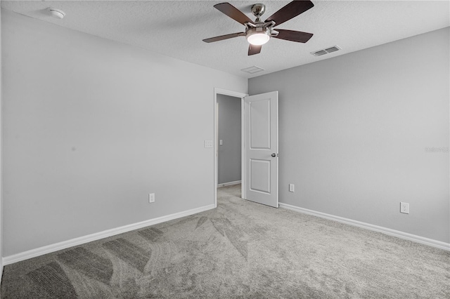 840 Livestock Loop, Saint Cloud, FL 34771 - carpeted spare room featuring ceiling fan, a textured ceiling, and a smoke detector