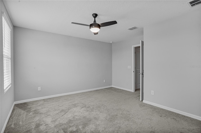 840 Livestock Loop, Saint Cloud, FL 34771 - carpeted empty room with plenty of natural light and a ceiling fan
