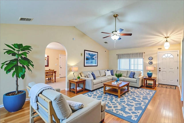 1073 Sadie Ln, Winter Garden, FL 34787 - living area with arched walkways, ceiling fan, lofted ceiling, and light wood-type flooring