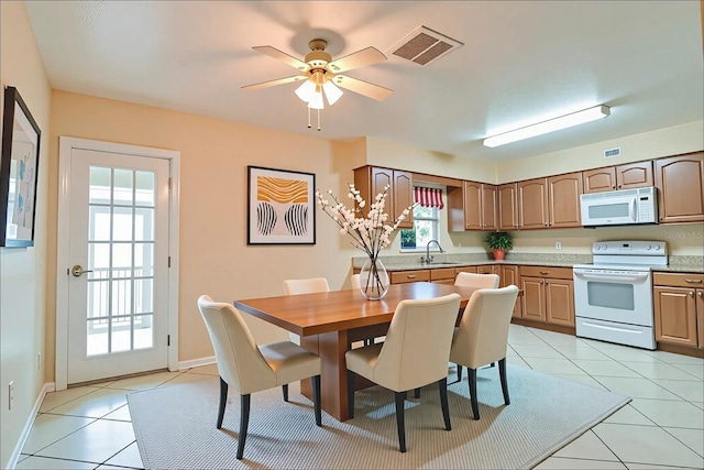 1073 Sadie Ln, Winter Garden, FL 34787 - dining space with light tile patterned floors and ceiling fan