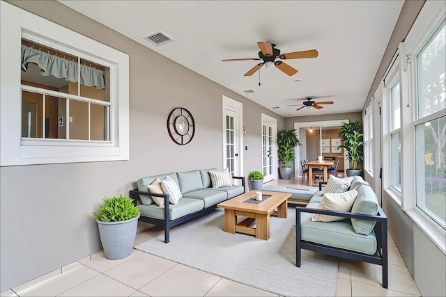 1073 Sadie Ln, Winter Garden, FL 34787 - sunroom / solarium featuring french doors and plenty of natural light