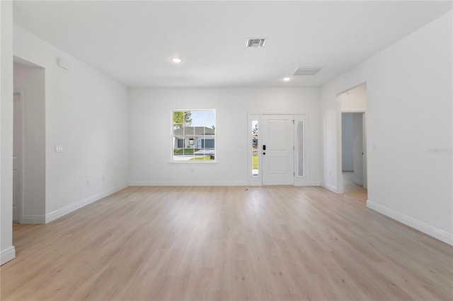 709 Marion Oaks Mnr, Ocala, FL 34473 - foyer with light wood-style flooring and recessed lighting