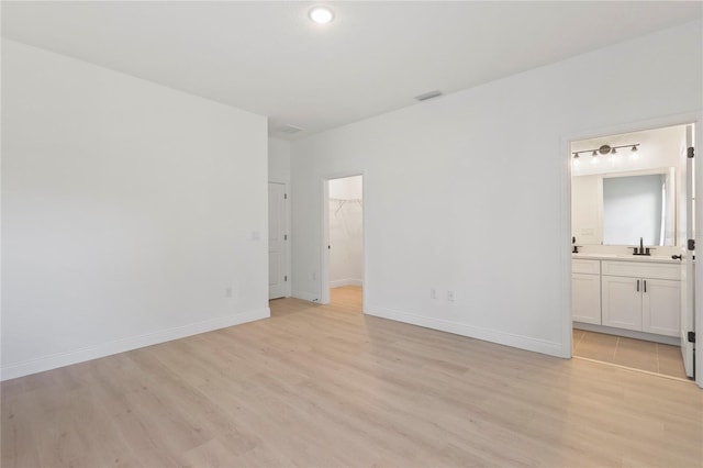 709 Marion Oaks Mnr, Ocala, FL 34473 - unfurnished room featuring light wood-style floors