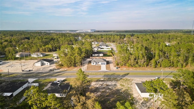 709 Marion Oaks Mnr, Ocala, FL 34473 - aerial view of property and surrounding area with a forest and nearby suburban area