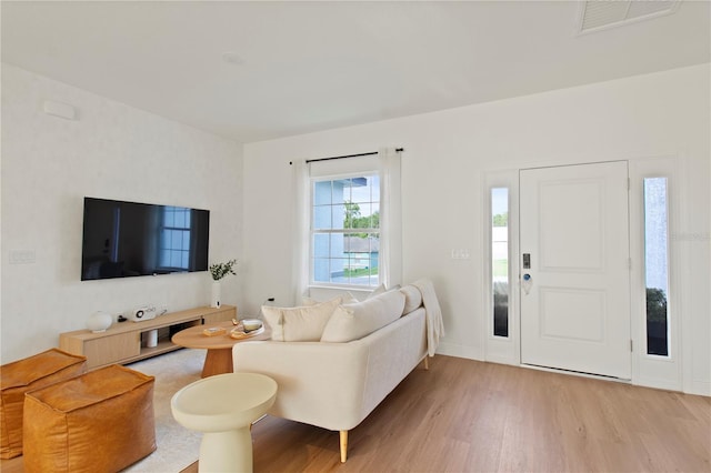 709 Marion Oaks Mnr, Ocala, FL 34473 - living room featuring light wood-style floors