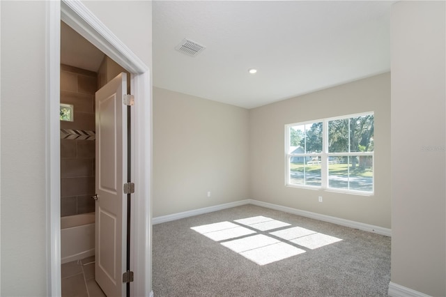 2833 E Newhaven St, Inverness, FL 34453 - carpeted empty room featuring baseboards and recessed lighting