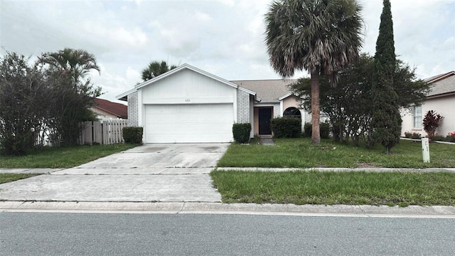 5265 Broken Arrow Dr, Kissimmee, FL 34746 - ranch-style house featuring a garage and driveway