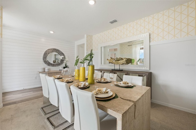 3413 Wynwood Forest Dr, Ocoee, FL 34761 - dining area featuring carpet floors, wallpapered walls, and recessed lighting