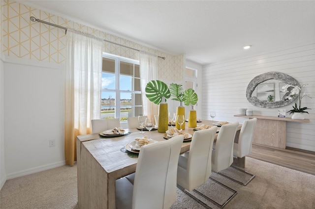 3413 Wynwood Forest Dr, Ocoee, FL 34761 - dining space with carpet flooring and a water view