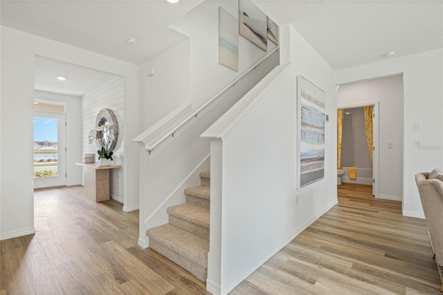 3413 Wynwood Forest Dr, Ocoee, FL 34761 - stairway featuring wood finished floors and recessed lighting