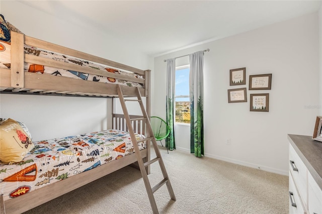 3413 Wynwood Forest Dr, Ocoee, FL 34761 - bedroom with light carpet and baseboards