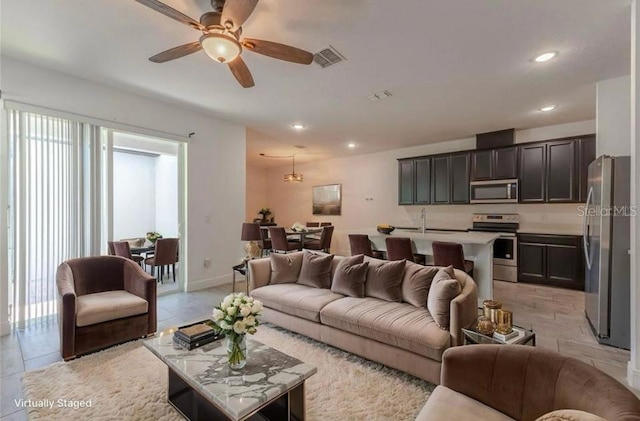 14007 Picard Aly, Winter Garden, FL 34787 - living area featuring a ceiling fan, recessed lighting, and light tile patterned flooring