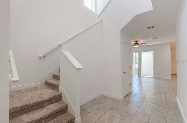 14007 Picard Aly, Winter Garden, FL 34787 - stairway with a ceiling fan and tile patterned flooring