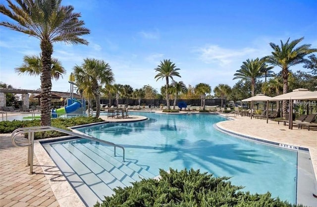 14007 Picard Aly, Winter Garden, FL 34787 - community pool featuring a patio area