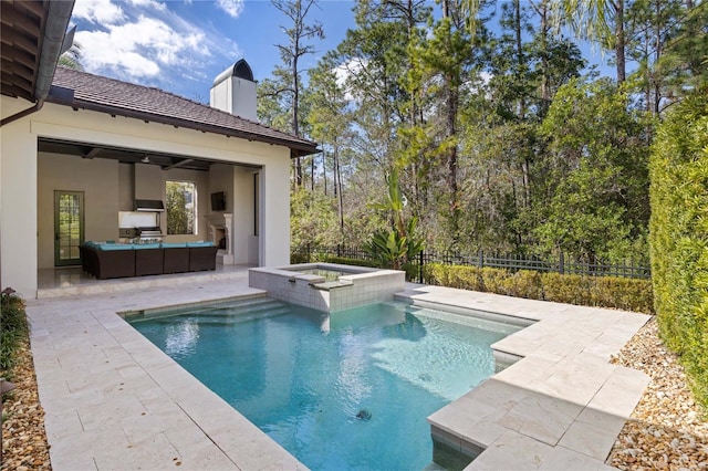 10143 Mattraw Pl, Golden Oak, FL 32836 - view of pool featuring a patio, an outdoor living space with a fireplace, and a pool with connected hot tub