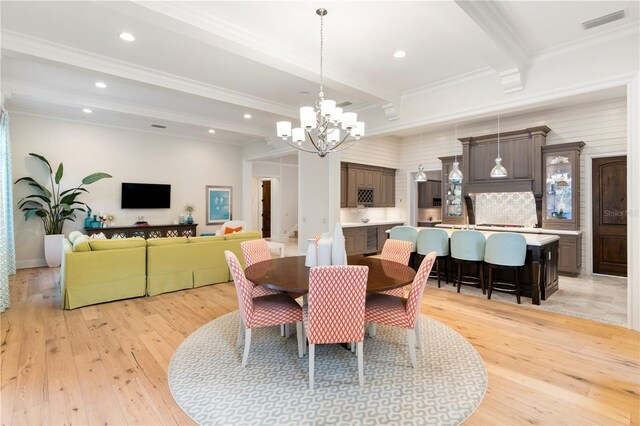 10143 Mattraw Pl, Golden Oak, FL 32836 - dining room with beamed ceiling, light wood-style flooring, a chandelier, crown molding, and recessed lighting