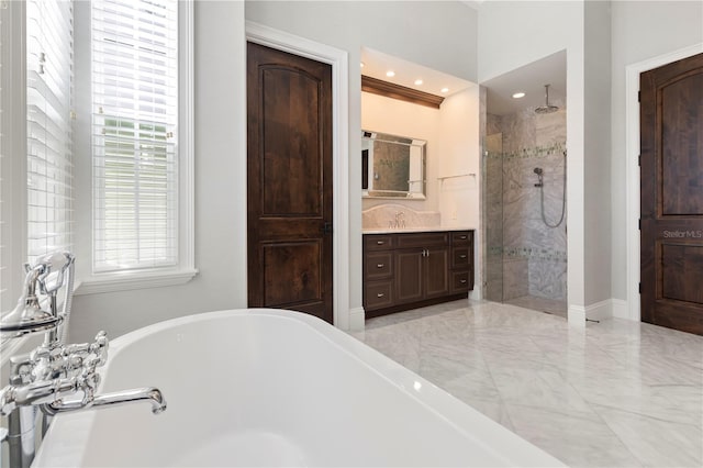 10143 Mattraw Pl, Golden Oak, FL 32836 - full bath featuring a freestanding tub, a tile shower, vanity, and marble tiled floors