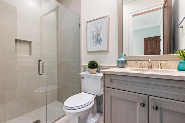 10143 Mattraw Pl, Golden Oak, FL 32836 - bathroom featuring vanity, a shower stall, crown molding, and tile walls