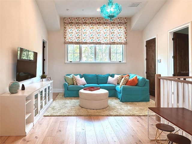 10143 Mattraw Pl, Golden Oak, FL 32836 - living room featuring hardwood / wood-style flooring and baseboards