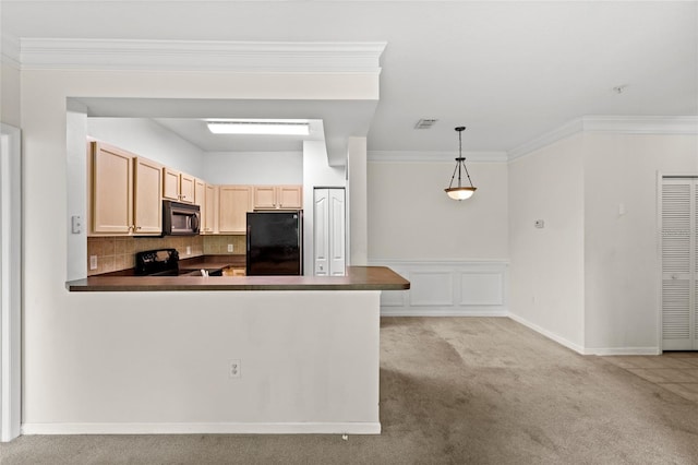 12843 Madison Pointe Unit 208, Orlando, FL 32821 - kitchen with black appliances, dark countertops, light carpet, ornamental molding, and light brown cabinets