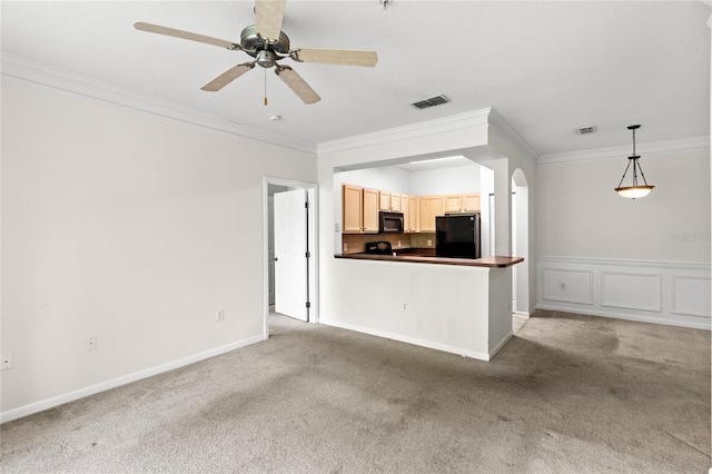 12843 Madison Pointe Unit 208, Orlando, FL 32821 - unfurnished living room with ornamental molding, light colored carpet, and a ceiling fan
