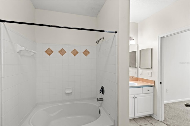 12843 Madison Pointe Unit 208, Orlando, FL 32821 - full bath featuring vanity, shower / tub combination, and tile patterned floors