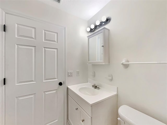 1877 Courtland Blvd, Deltona, FL 32738 - bathroom featuring vanity and toilet
