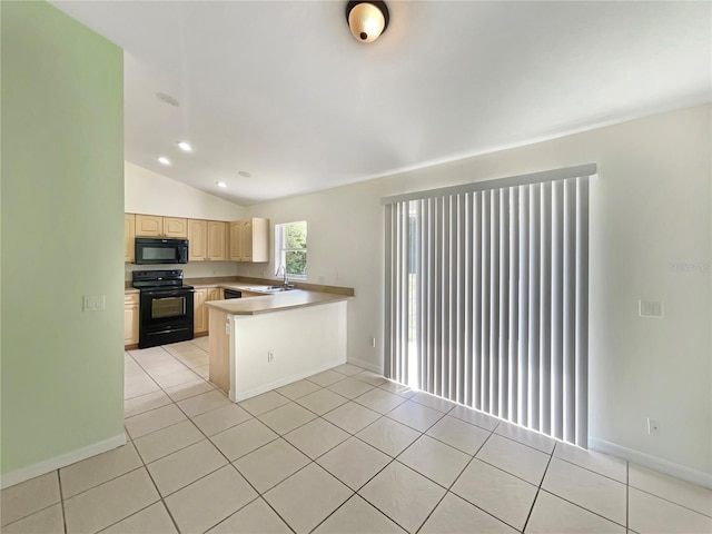 1877 Courtland Blvd, Deltona, FL 32738 - kitchen with black appliances, light brown cabinetry, a peninsula, vaulted ceiling, and light tile patterned flooring