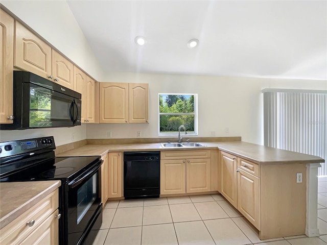 1877 Courtland Blvd, Deltona, FL 32738 - kitchen with black appliances, light brown cabinets, a peninsula, healthy amount of natural light, and vaulted ceiling
