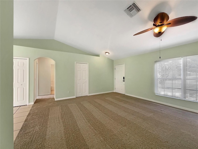 1877 Courtland Blvd, Deltona, FL 32738 - carpeted spare room featuring arched walkways, lofted ceiling, and ceiling fan