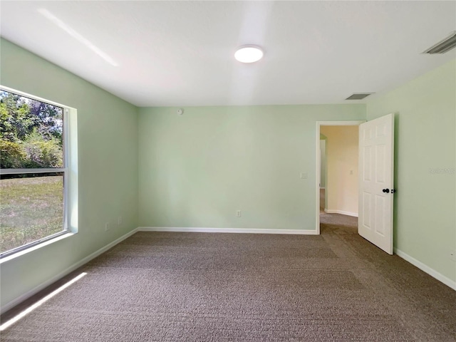 1877 Courtland Blvd, Deltona, FL 32738 - carpeted spare room with healthy amount of natural light