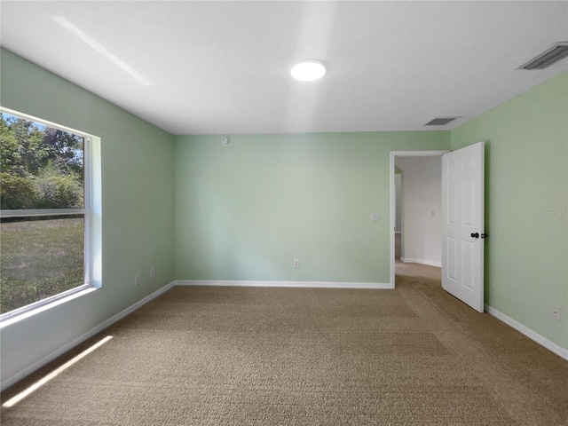 1877 Courtland Blvd, Deltona, FL 32738 - spare room featuring carpet flooring